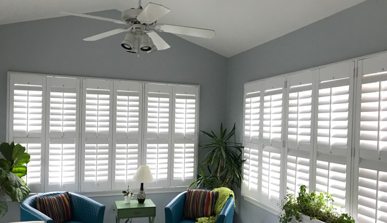 Indianapolis sunroom with fan and shutters